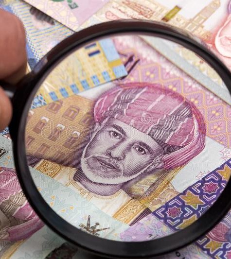 omani-rial-magnifying-glass-business-background-omani-rial-magnifying-glass-198097699