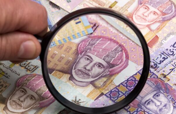 omani-rial-magnifying-glass-business-background-omani-rial-magnifying-glass-198097699